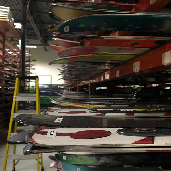 Thousands of used skis congregate in Powder7 from the four corners of the globe, waiting to be dispatched into loving hands again.