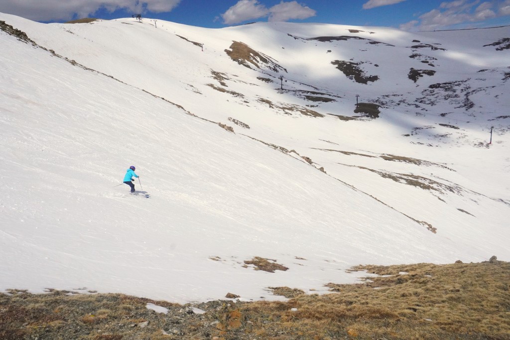 Alex skiing the Volkl Secret 102 at Loveland